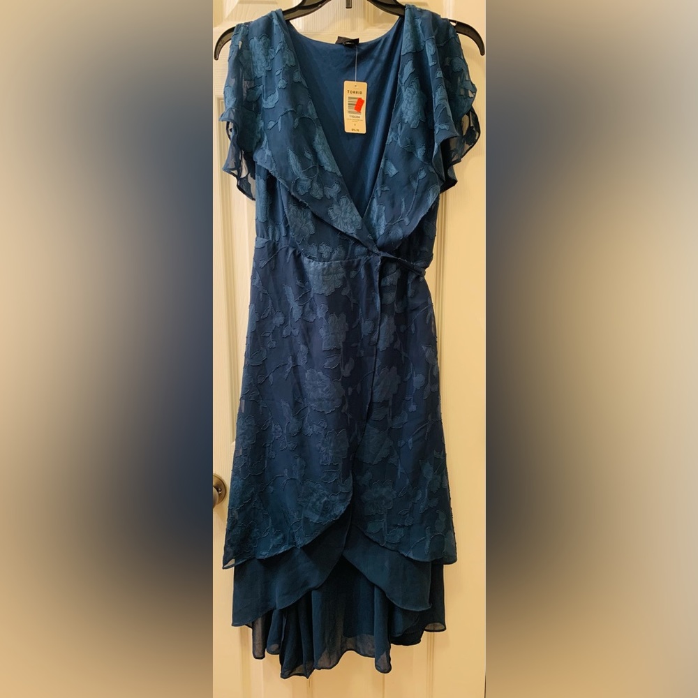 Torrid O Plus size tie side, assymetrical, ruffle sleeve dress.